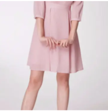 dress with pleats on the chest and minimalist
